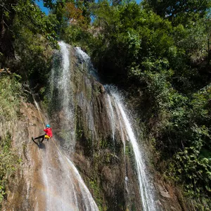 a girl doing Canyoning in Nepal The Last Resort